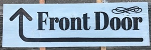 Front door sign with arrow