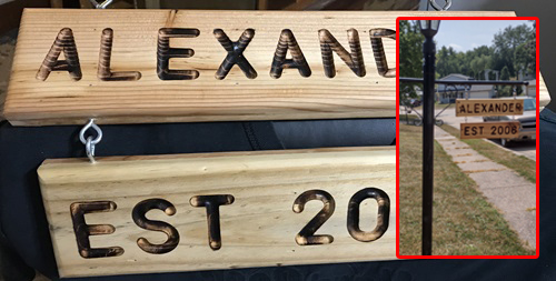 Double sided lamp post sign